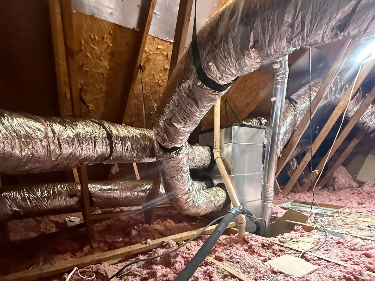 Technician replacing ductwork in Houston TX